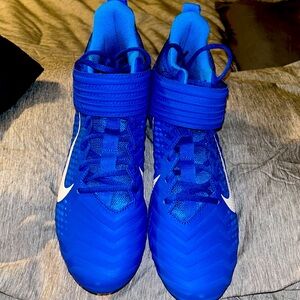 Blue and white football cleats size 10.5